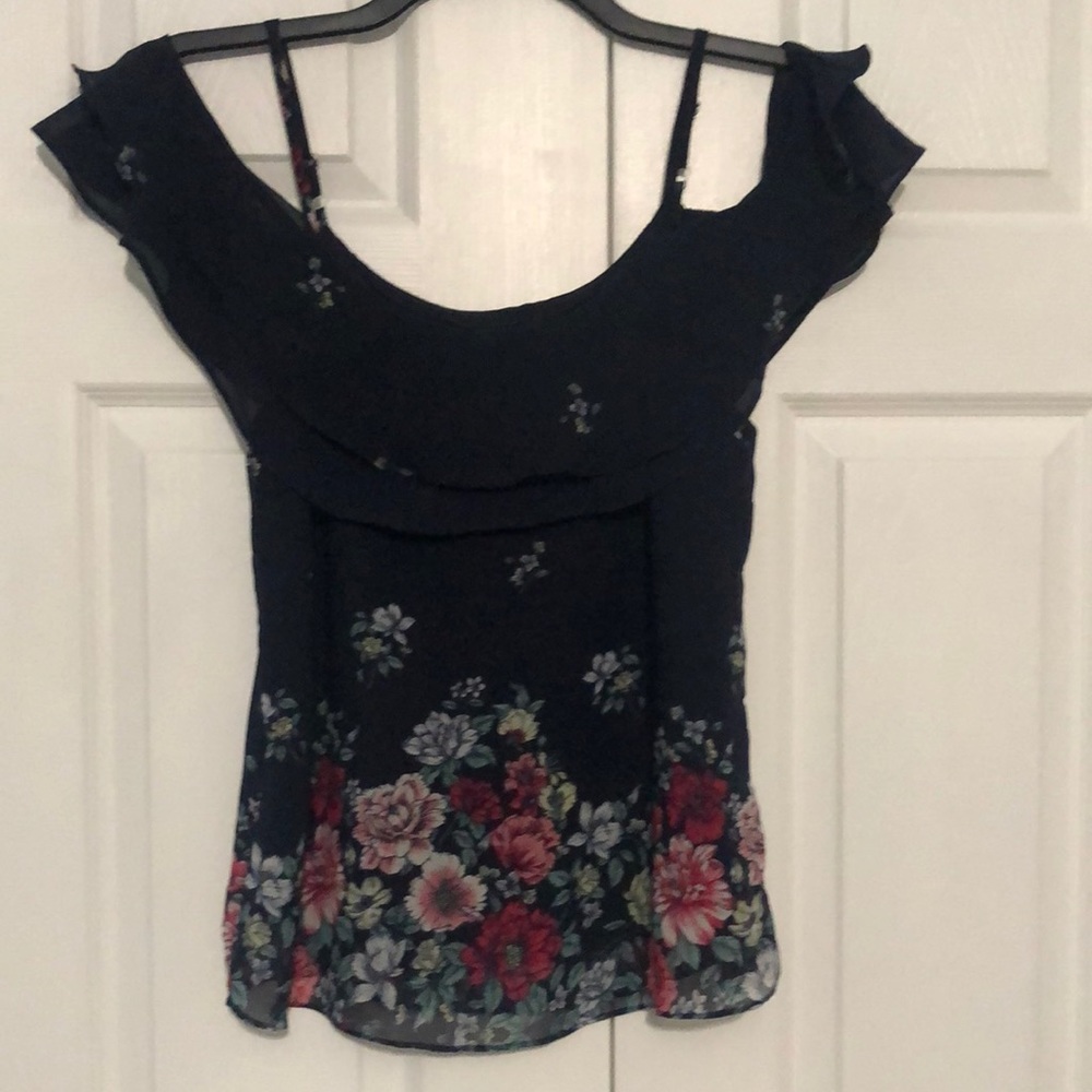 A Byer next to new blouse, drop shoulder